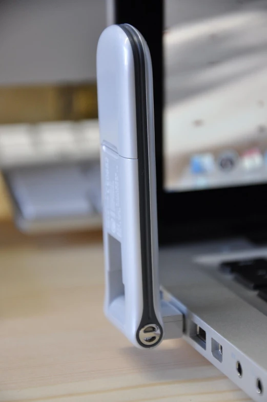 a usb dock connected to a laptop computer