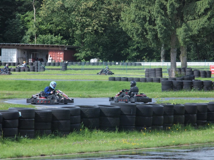 two people on motorcycles in a race