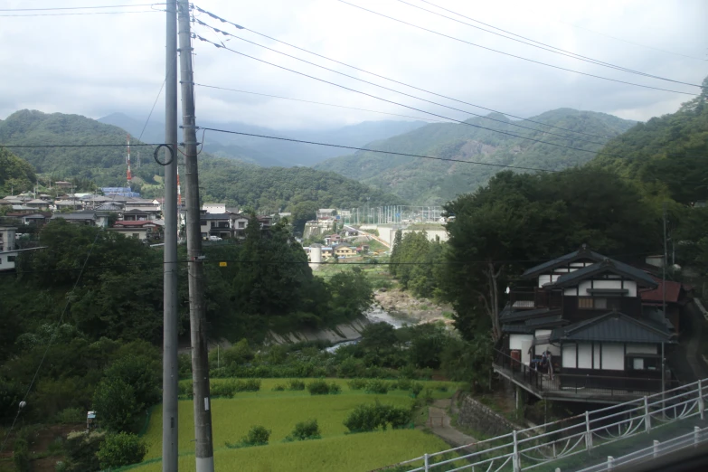 an old town with lots of hills in the background