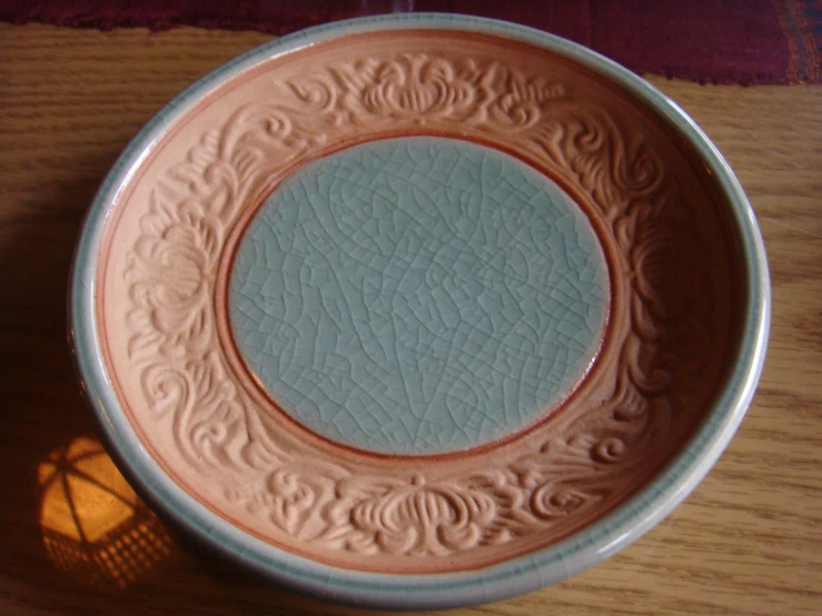 a bowl has many designs and looks similar to an old pattern