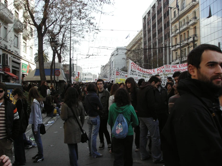 a very crowded street with a large group of people