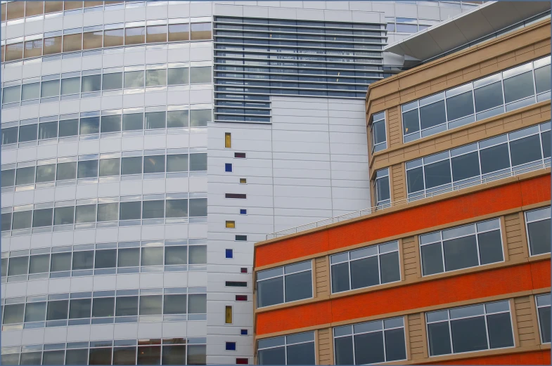 a colorful po of a building and another tall building