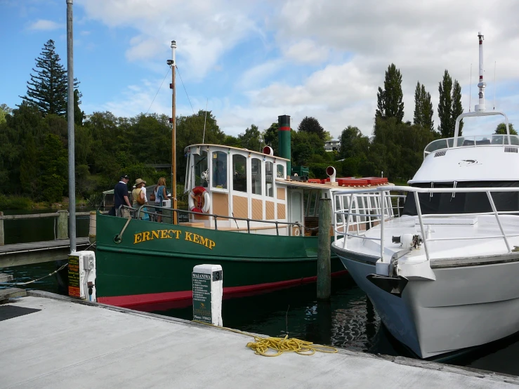 two boats in a body of water near one another