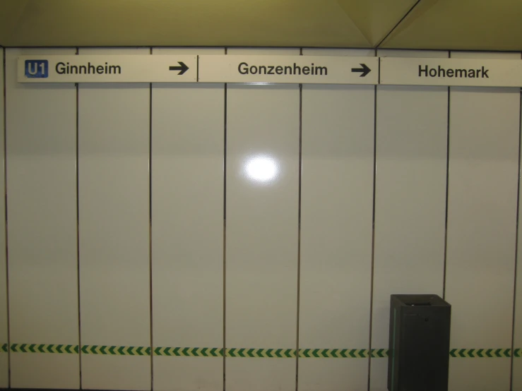 the train station has four lines with a white divider