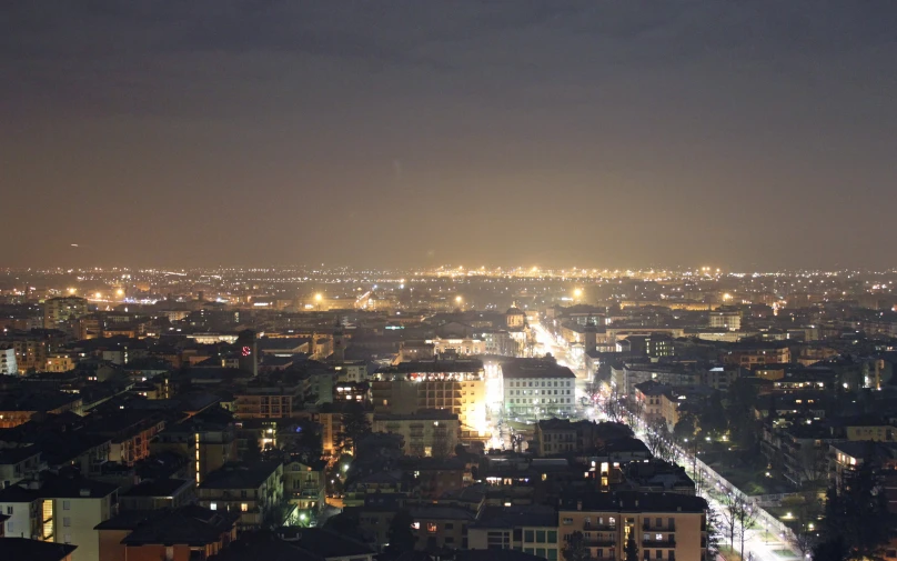 a city at night with street lights