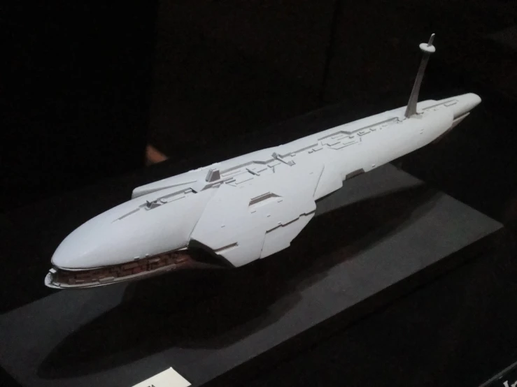 a model of a military air craft sits on display