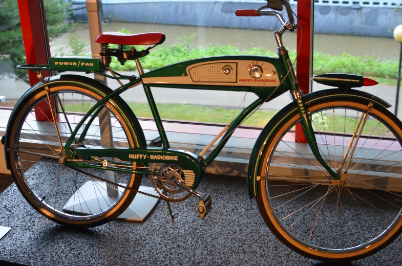 a bicycle sitting next to a window