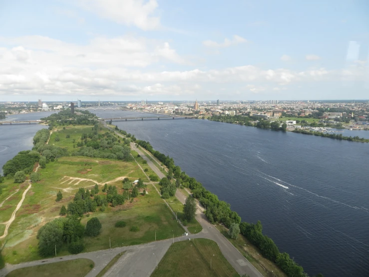 an aerial view of the waterway and its park, city