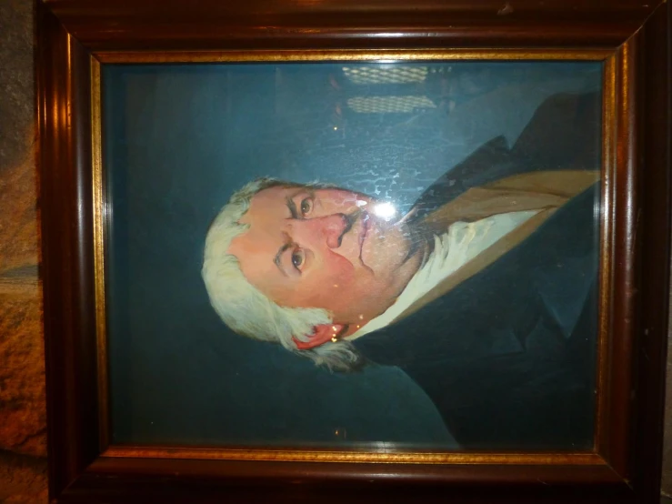 an image of an old man in a frame