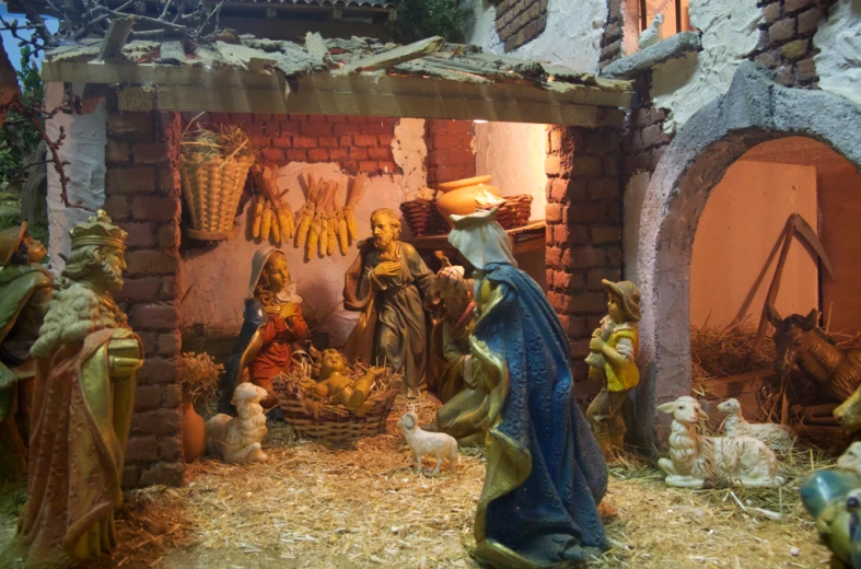 a nativity scene with three wise men and one baby jesus