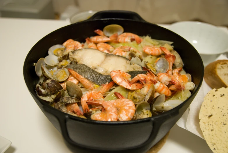 food is being prepared in a set on a white surface