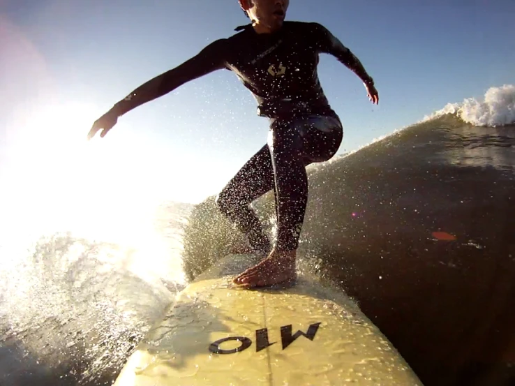 a man that is on a surfboard in the water