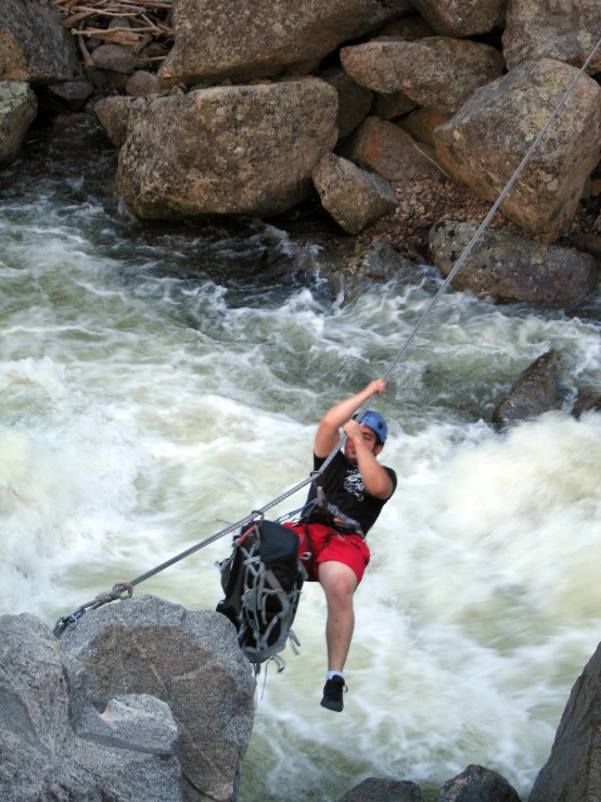 the man is getting ready to go on a ropes jump