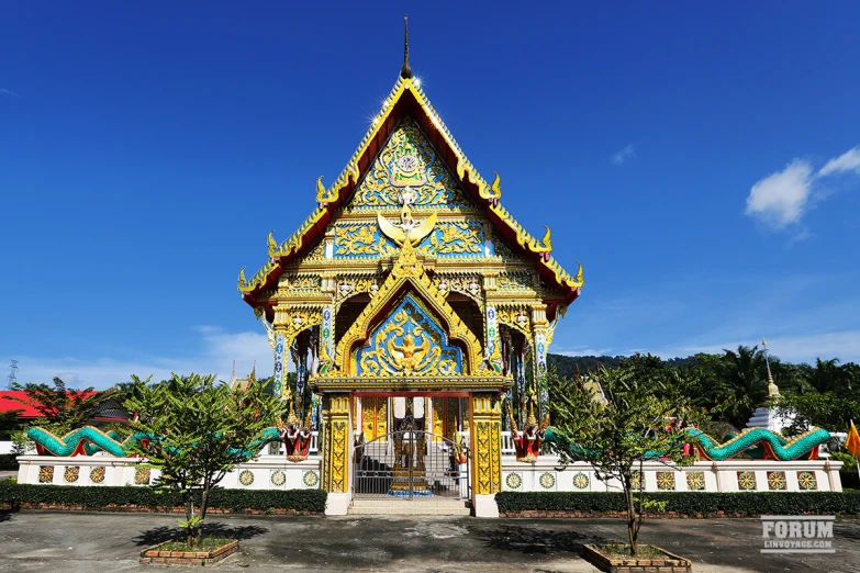 a colorful building sitting on top of a street