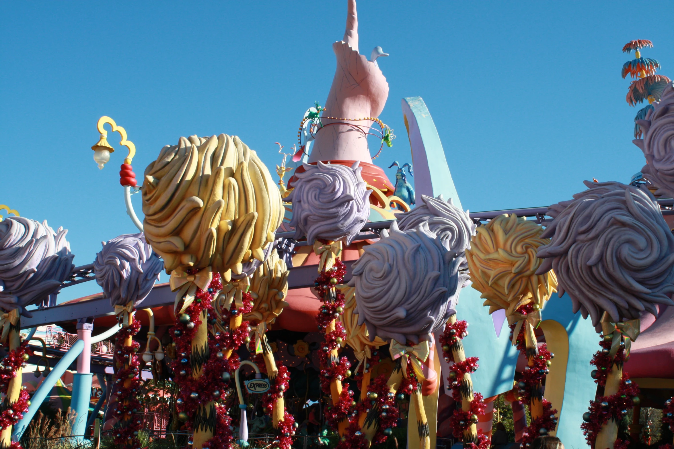 a woman is seen on the roof of an amut attraction