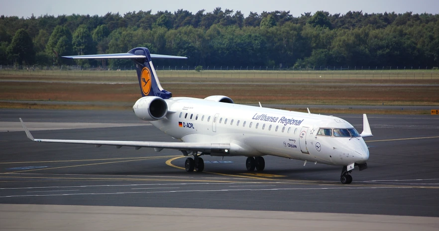 a plane is sitting on the runway waiting for takeoff