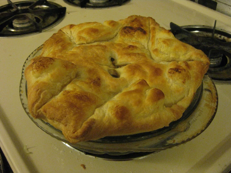 a pie that is on top of a stove