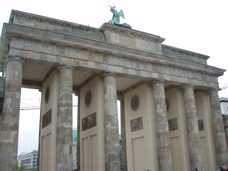 the front entrance to the city with pillars