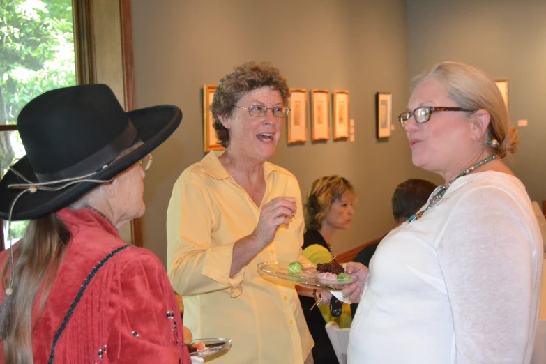 three women are talking and having fun at the same time