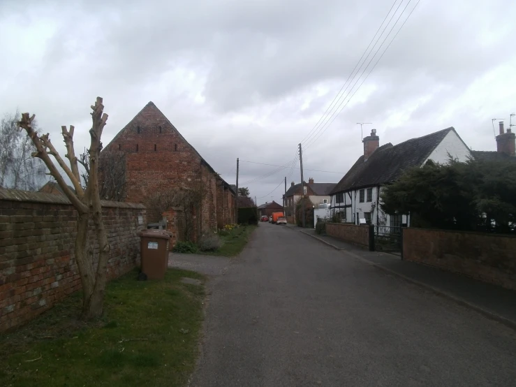 a street view looking at some small buildings