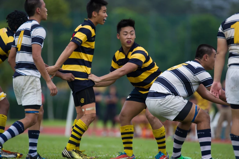 players from both teams face off in a match