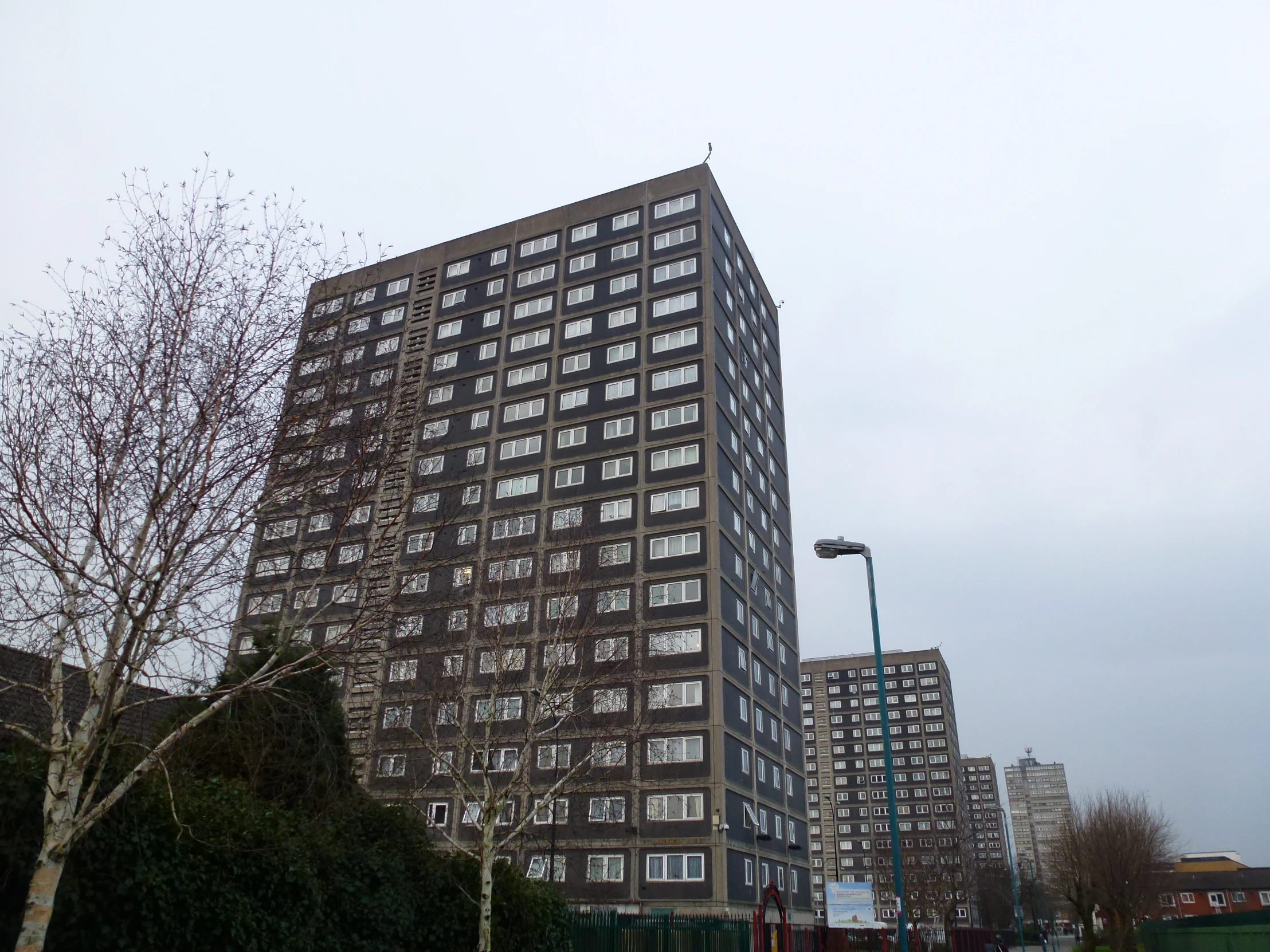 the large building has lots of windows on it