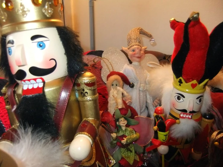 an elaborately decorated nuter, santa claus, a gold - colored head and a red dress