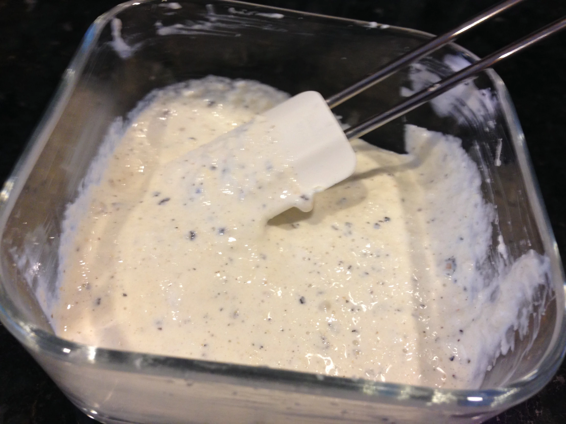 a food processor filled with batter and other items