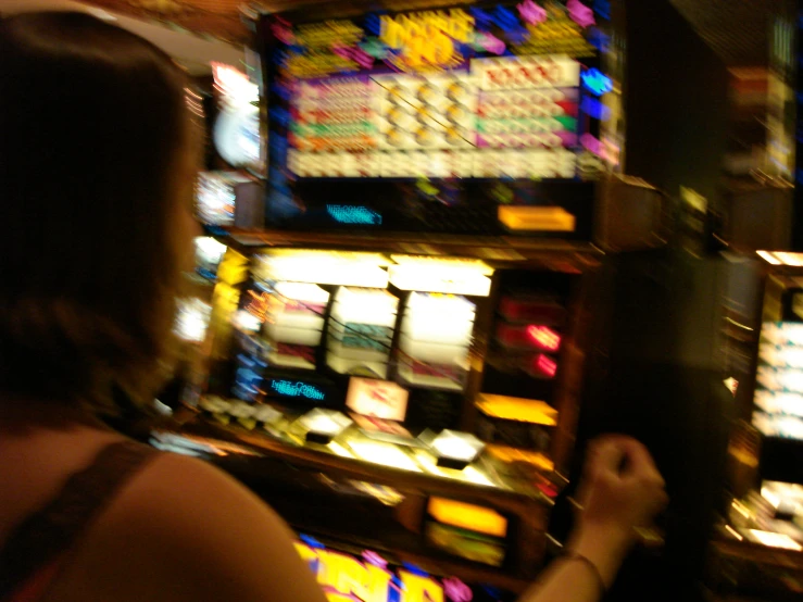 a woman is playing casino on the big wheel