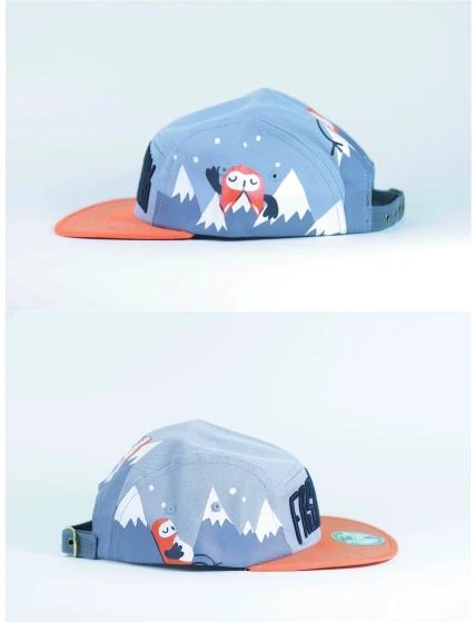 two views of a hat one has an owl and the other is snow