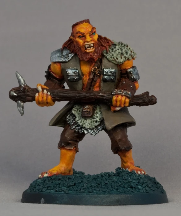an action figure of a troll holding a long sword