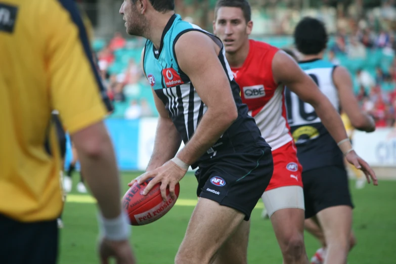 a man holding a ball in one hand