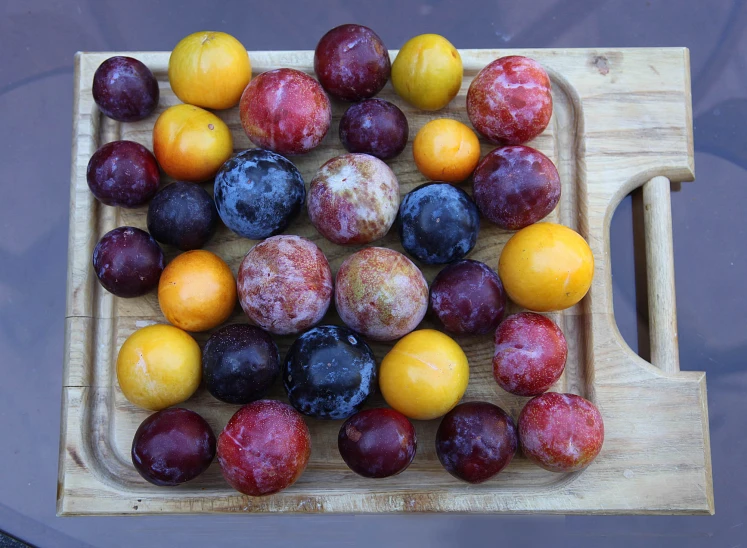 a  board with a variety of fruit on it