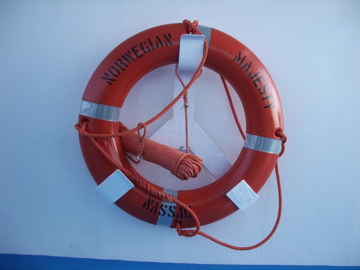 a life preserver with the word mouvecane mallet attached to it