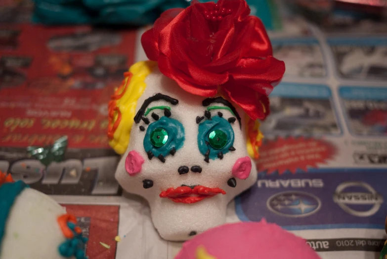 the toy doll is made with a colored face