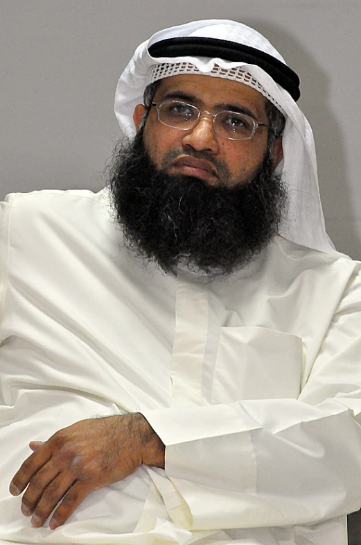 an image of man with a beard and glasses