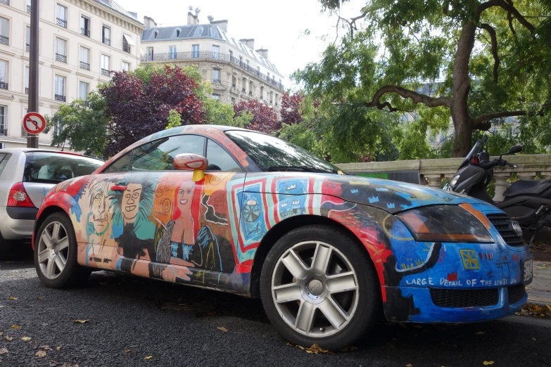 a car that has been covered with a cartoon car wrap