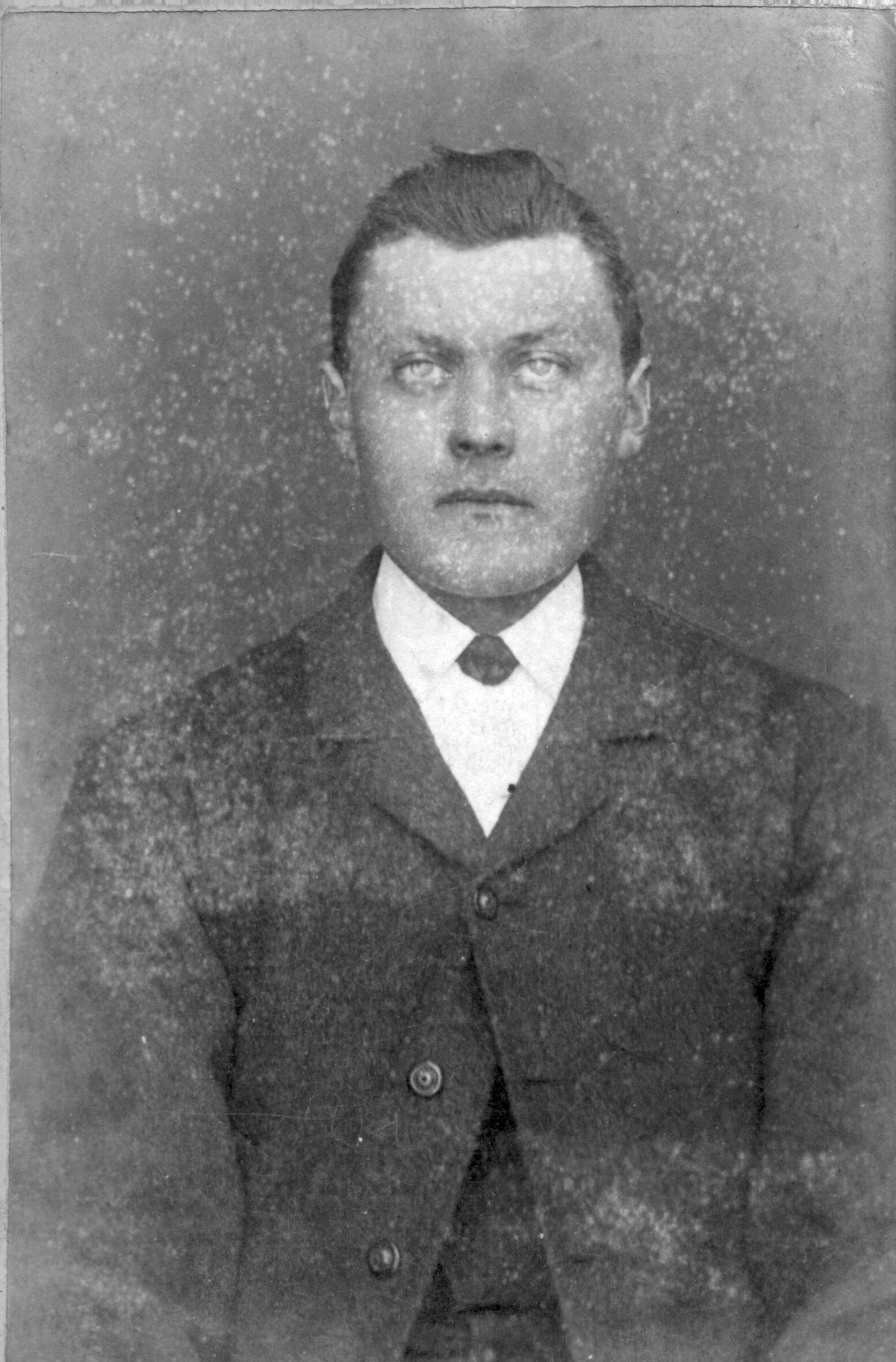 a man wearing a tie and a jacket