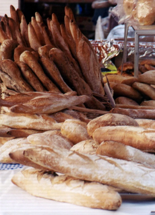 a table filled with a couple of breads