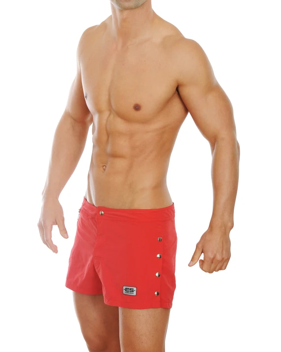 a shirtless man in red trunks wearing red and black