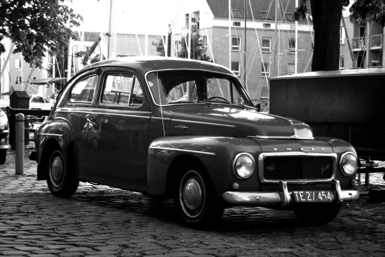 a black and white po of an old car