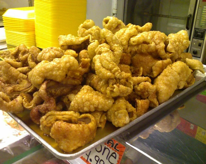 an image of fried food sitting on display