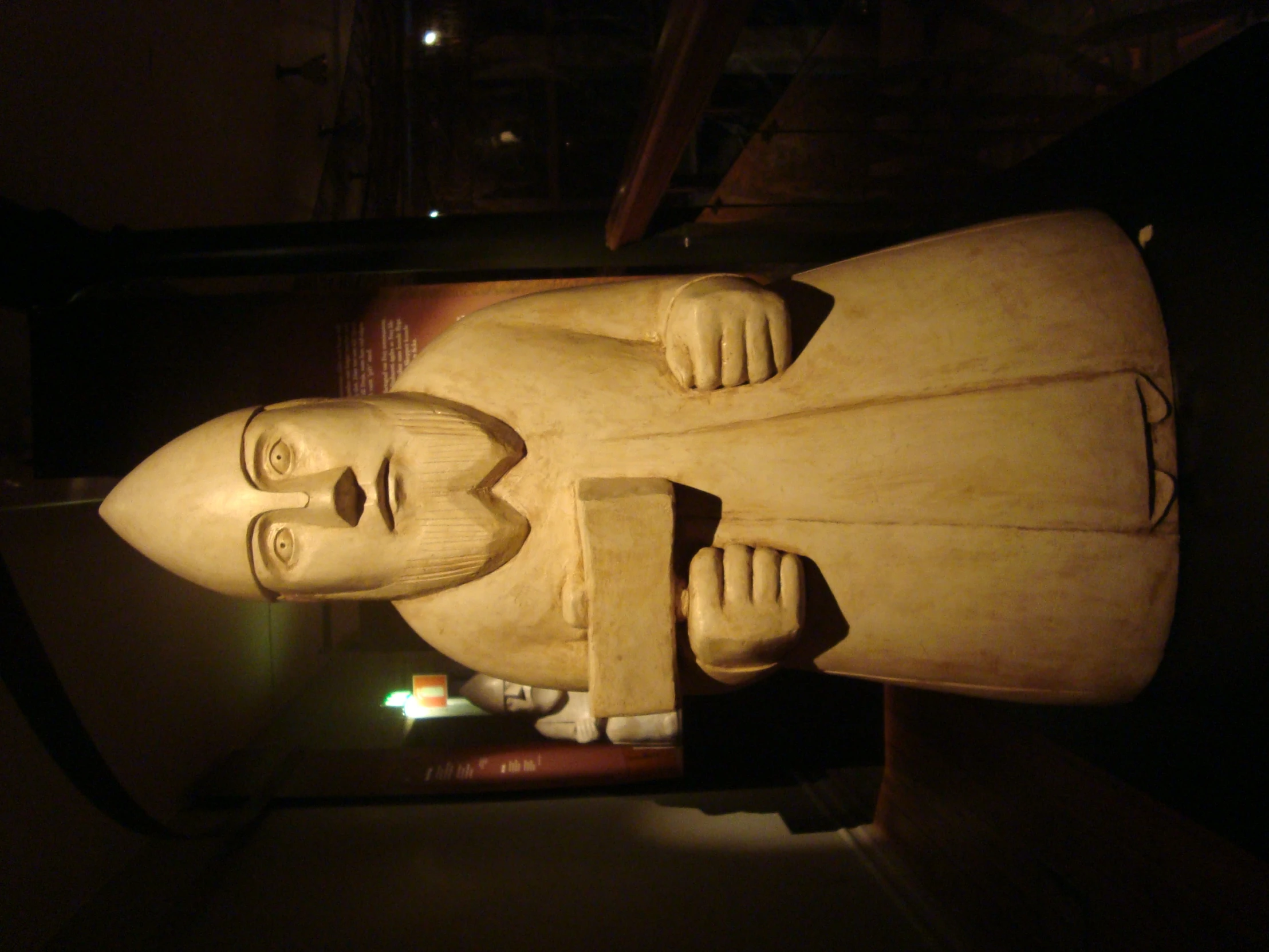 a large carved statue of an old man