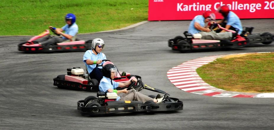 people riding bumper cars at a race track