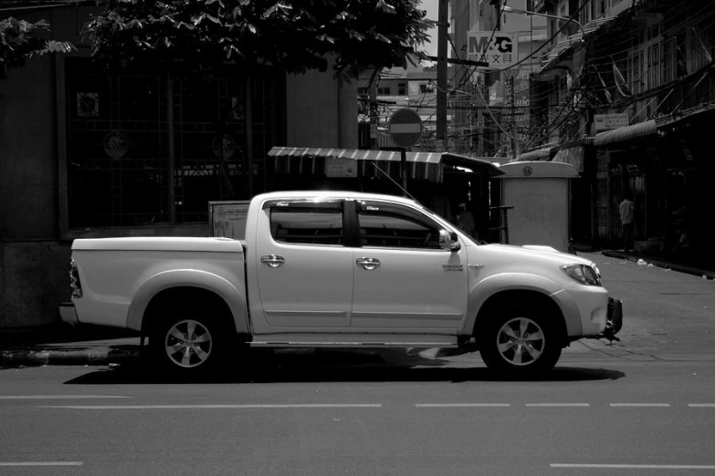 a truck parked on the side of a street