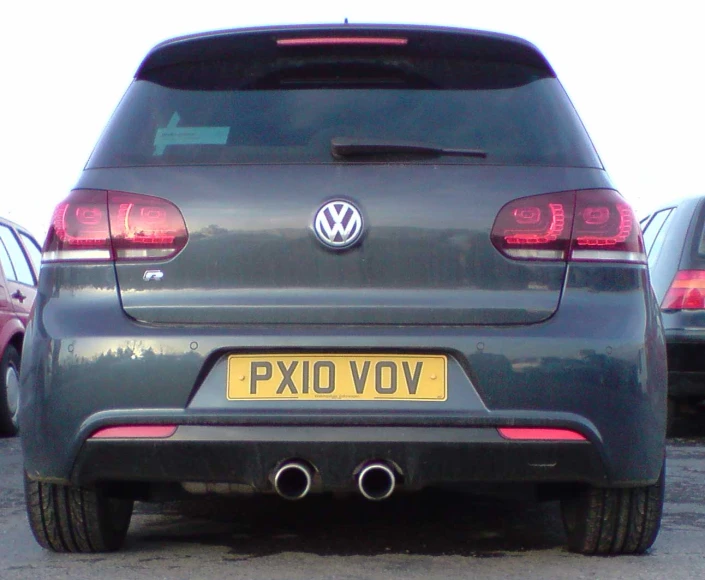 a volkswagen car that has the number plate pixi vov