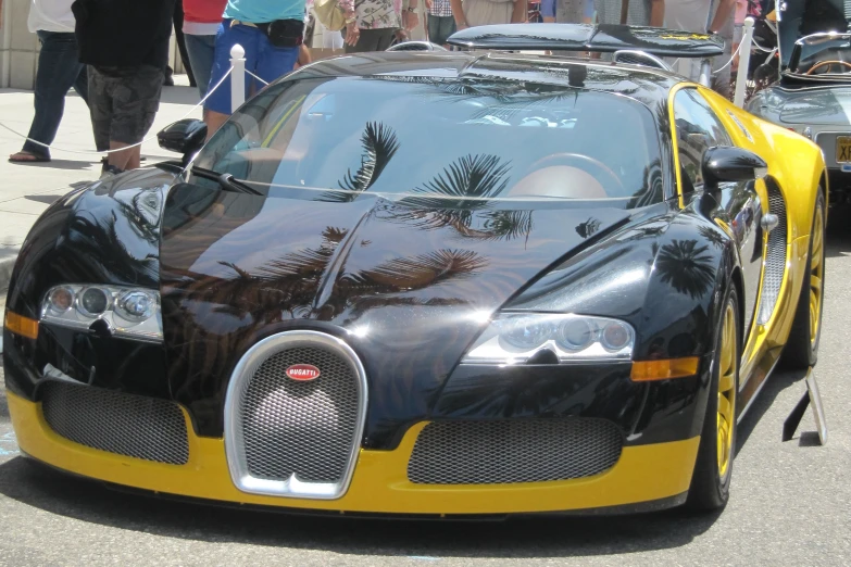 the bugatti is black and yellow