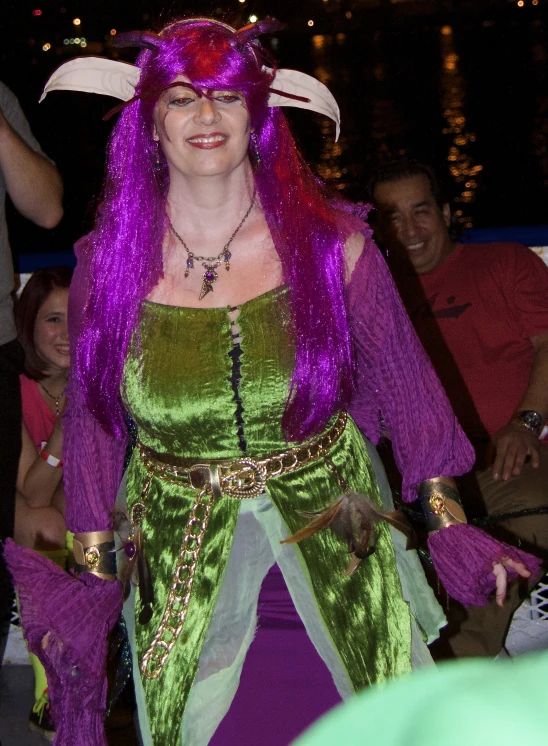 a woman dressed up and wearing purple hair