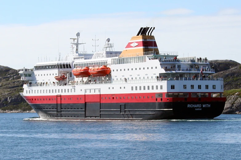 a large boat traveling across a body of water