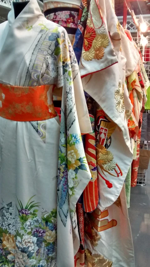 kimonos on display at a store with various patterns